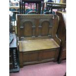 An Oak Bench, with knulled twin arched back.