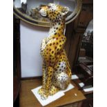 A Large Pottery Model Seated Cheetah, (ex John Lewis), height 85cm.