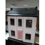 A Large Pink Painted Dolls House.