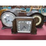 An Enfield Bakelite Cased Mantel Clock, a Smith's example missing glass, another in oak. (3)