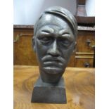 A Reproduction Pitted and Bronzed Effect Bust of Hitler, on squared plinth, overall height 20cm.