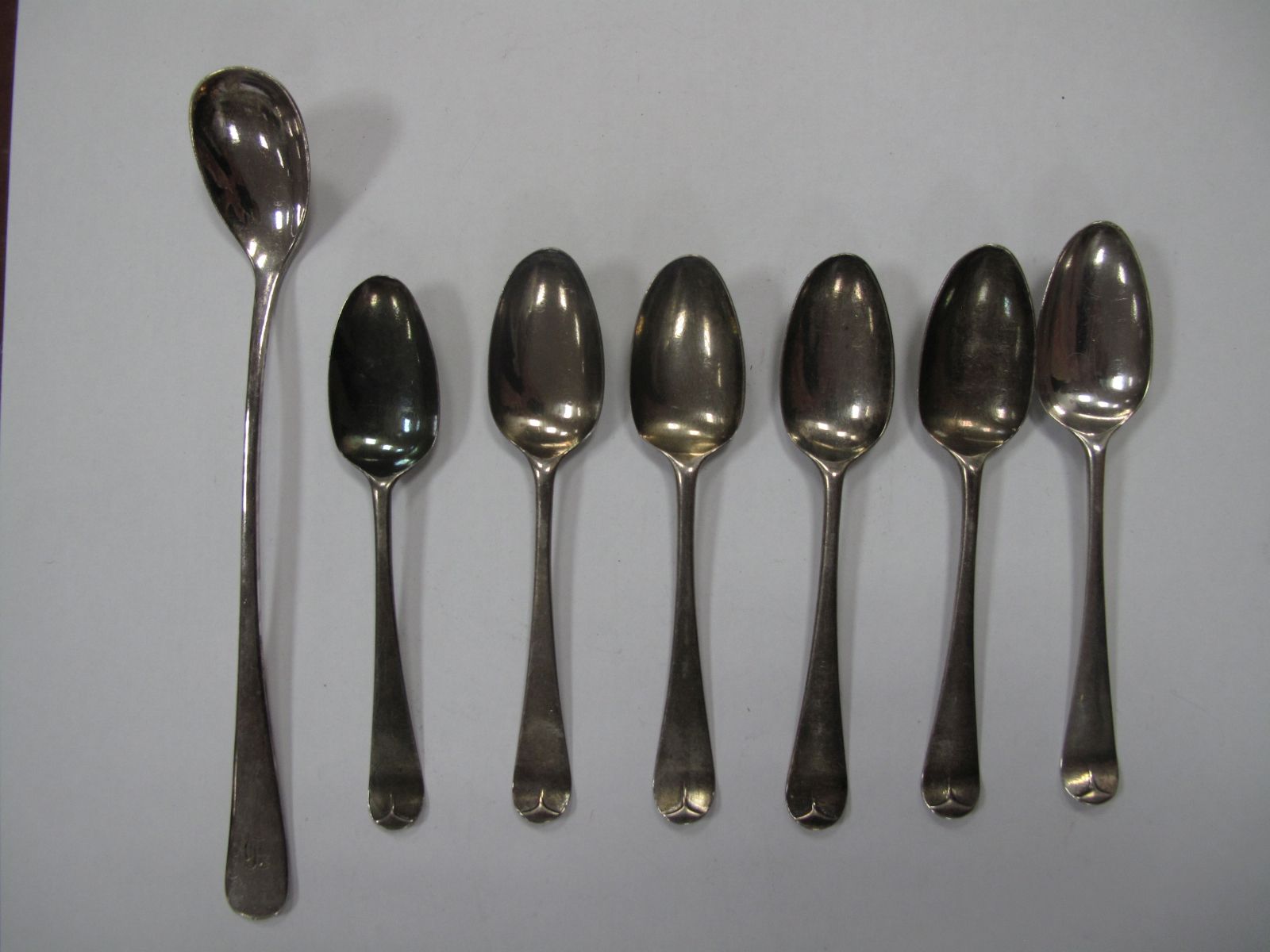 A Set of Six Part Hallmarked Silver Shell Back Coffee Spoons, stamped makers mark I. M., together