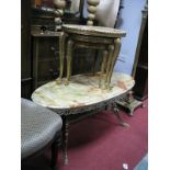An Oval Onyx Topped Coffee Table, a nest of three kidney shaped tables, all with gilt metal