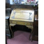 An Early XX Century Oak Bureau, with a 3/4 gallery back, fall front with applied decoration,