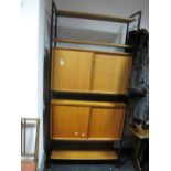 Staples Ladderax Teak Storage Shelves/Bookcase, circa 1970's with black metal ladder side supports.