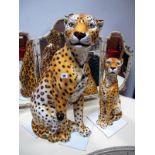 An Ex John Lewis Pottery Model Seated Mother Cheetah and kitten, height 68.5cm and 47cm. (2)