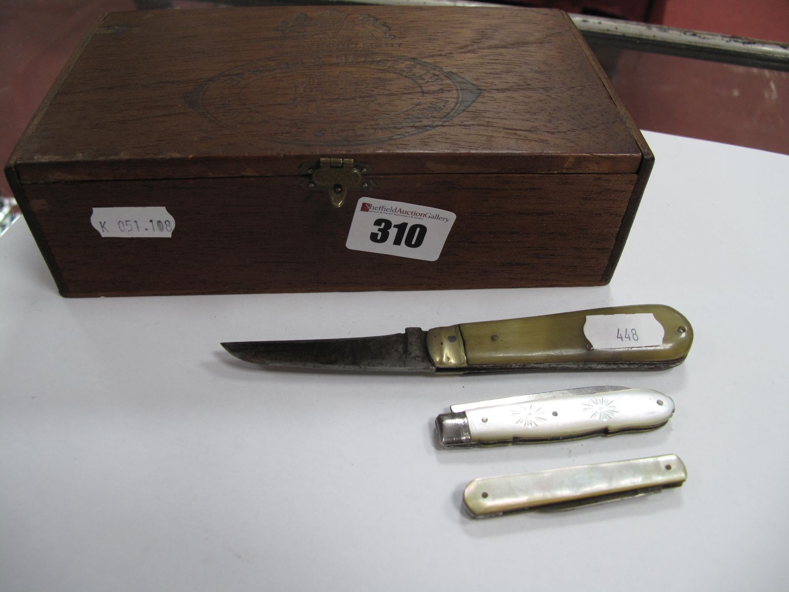 A Hallmarked Silver and Mother of Pearl Folding Fruit Knife; together with a pruning knife and a