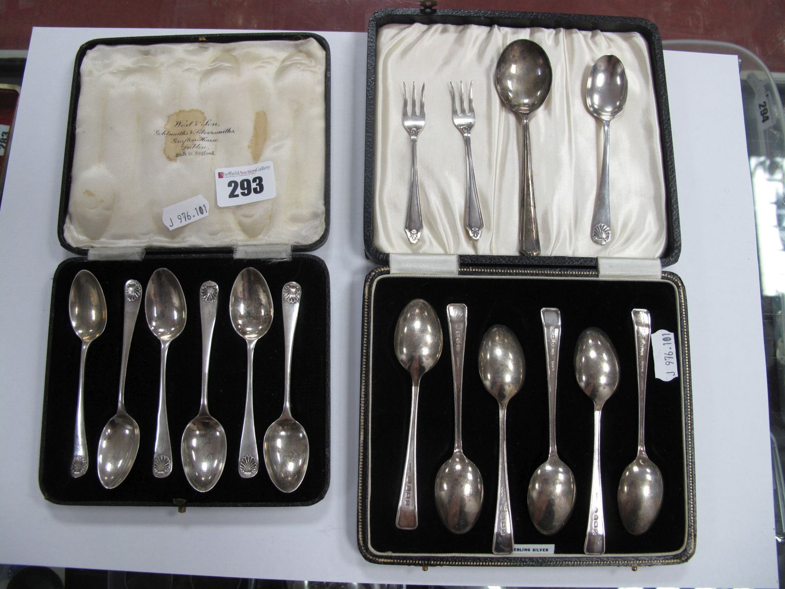 A Set of Six Hallmarked Silver Coffee Spoons, each with shell detail, in a fitted case; together