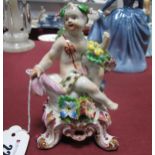 LOT WITHDRAWN - A XIX Century Bow Porcelain Figure of "Summer", the seated cupid raised upon