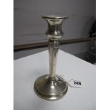A Hallmarked Silver Candlestick, with reeded detail, 14.2cm high.