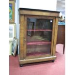 A XIX Century French Walnut Vitrine, with an ebonised moulded edge, glazed door, two inlaid internal