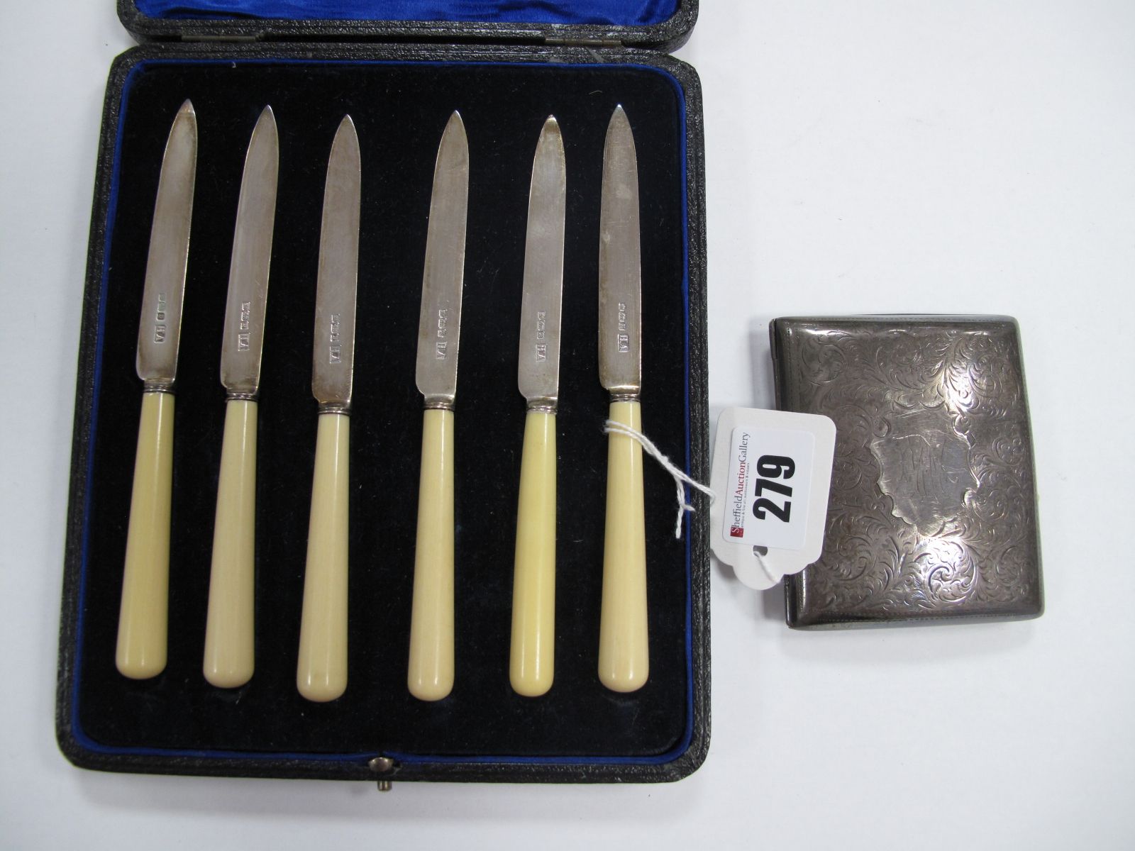 A Set of Six Dessert/Fruit Knives, each with hallmarked silver blade, Sheffield 1916, in fitted