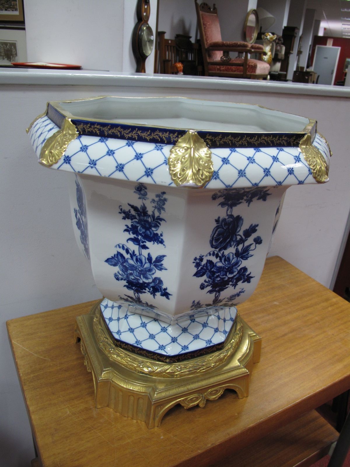 A XX Century French Ormolu-Mounted Porcelain Jardiniére, of octagonal section, blue and white