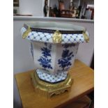 A XX Century French Ormolu-Mounted Porcelain Jardiniére, of octagonal section, blue and white