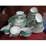 Losol Green and Gilt Banded Dinner Ware, of approximately fifty-eight pieces.