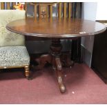 A XIX Century Mahogany Pedestal Table, with snap action on tripod base.