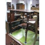 A Late XIX Century Mahogany Occasional Table, with wavy square top and undershelf united by sabre