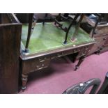 A XIX Century Mahogany Kneehole Desk, with an arrangement of five drawers, green leather scriver