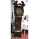 A Late XVIII Century Mahogany Eight-Day Longcase Clock, the circular scroll engraved brass dial