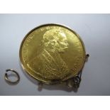 An Austria 4 Ducats, 1915, restrike, offered in a loose fitting pendant mount (marked "9ct").