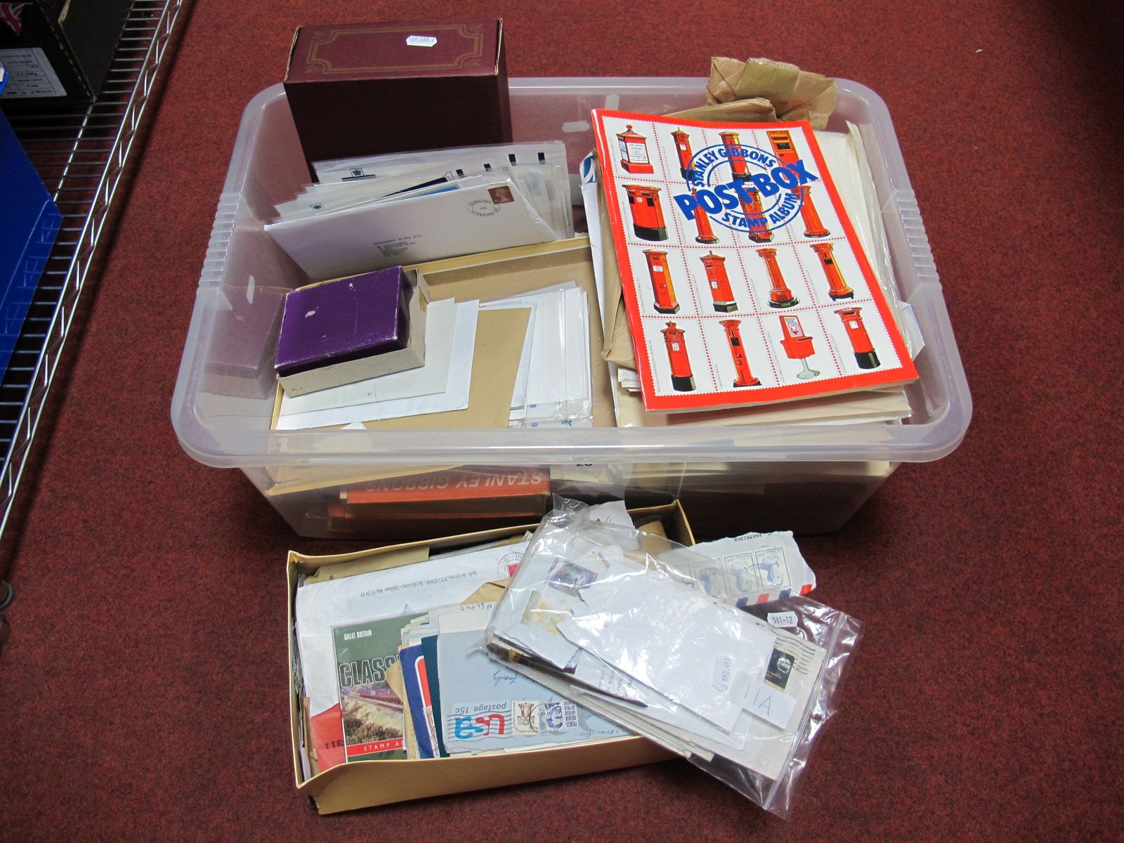 A Large Box of All World Stamps, with an A-Z collection on leaves, First Day covers, catalogues,