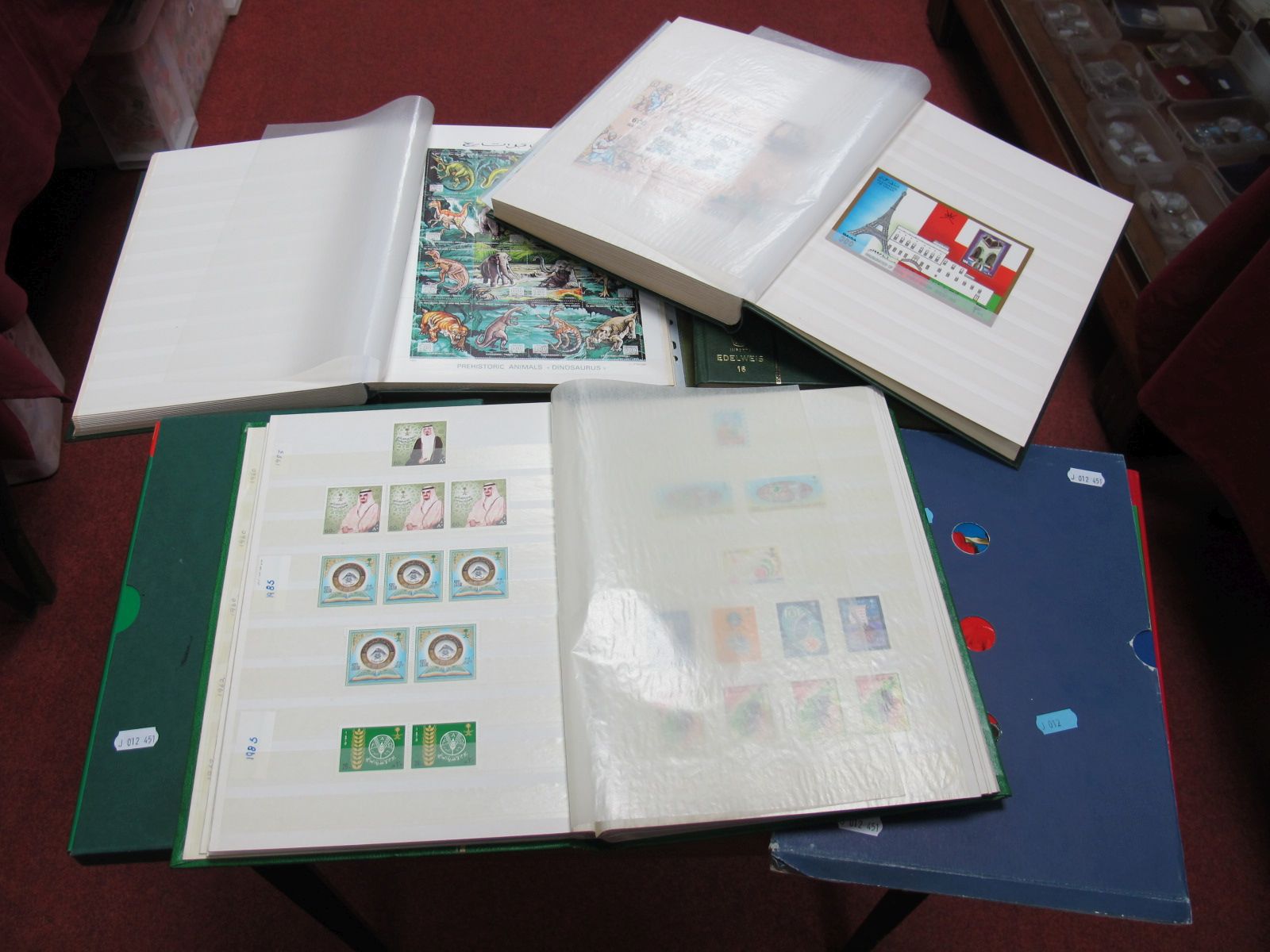 Stamps - An Excellent Collection of Middle East Stamps, in four large stock books in large plastic