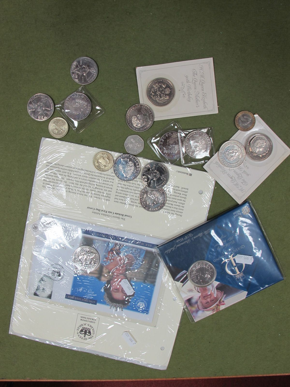 Thirteen Modern Base Metal Five Pounds Coins, three modern base metal two pounds coins and two fifty