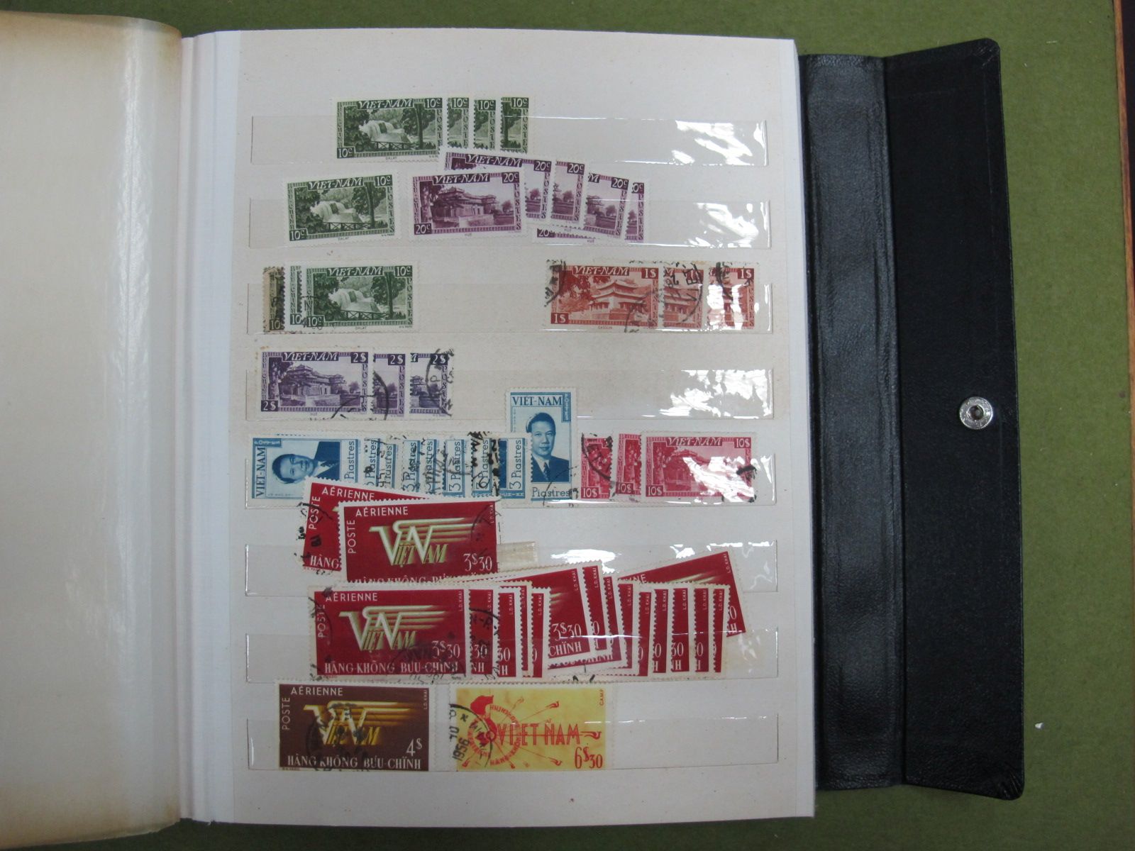 Stock Book With a Collection of Vietnam Stamps, early 1950's to late 1960's. Note duplication of