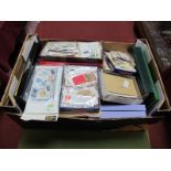 A Large Accumulation of Stamps, in two old Everest albums, small stock books and various small