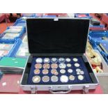 Twenty-Eight Coins, presented in a Ordex aluminium coin case (five trays to hold 205 coins. With