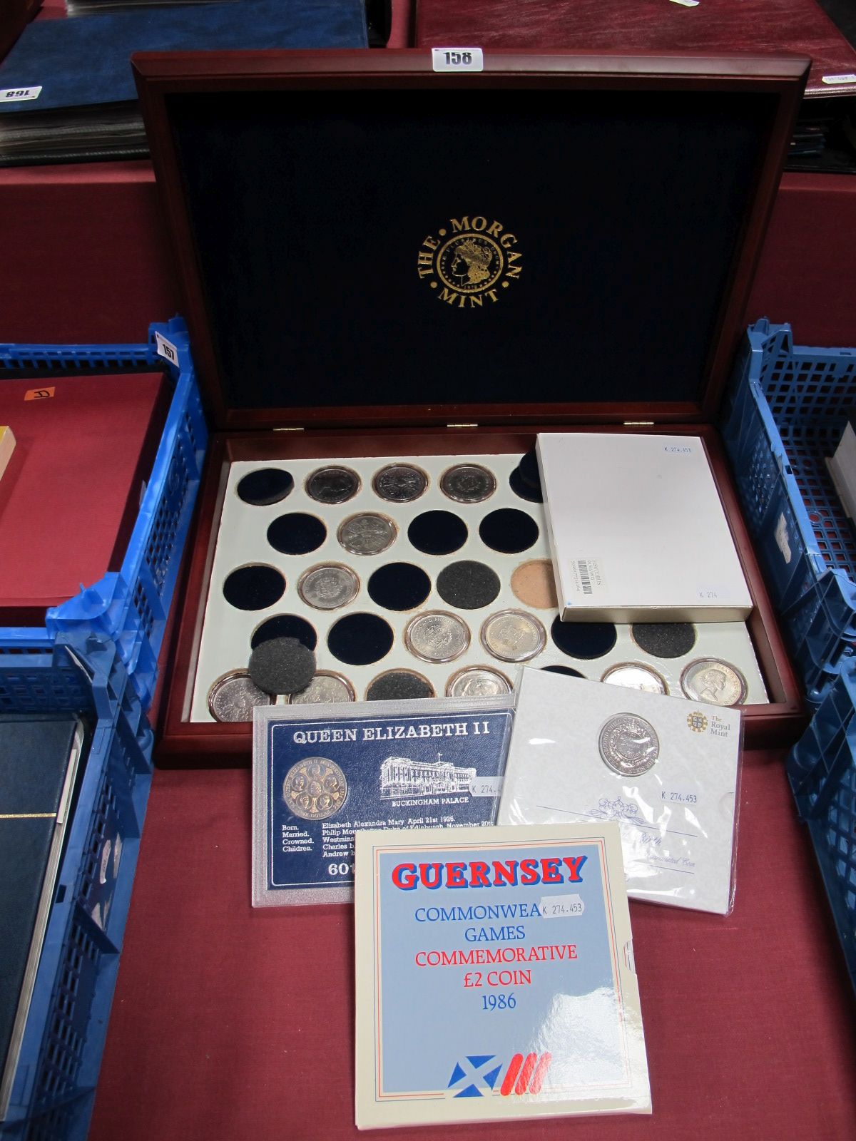 A Morgan Mint Presentation Case, (to hold thirty three coins), including seventeen commemorative