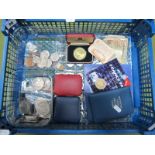 An Array of Numismatic Oddments, including base metal crowns, cased coins and coin sets,