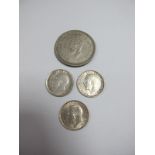 An Indian Rupee, 1942, VF. Sixpences: 1916, 1918 and 1919 (VF to EF).