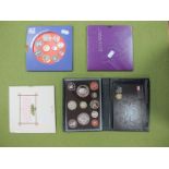 A GB Proof Set, 2008, UK Brilliant Uncirculated coin collections: 1987, 2004 and 2006.