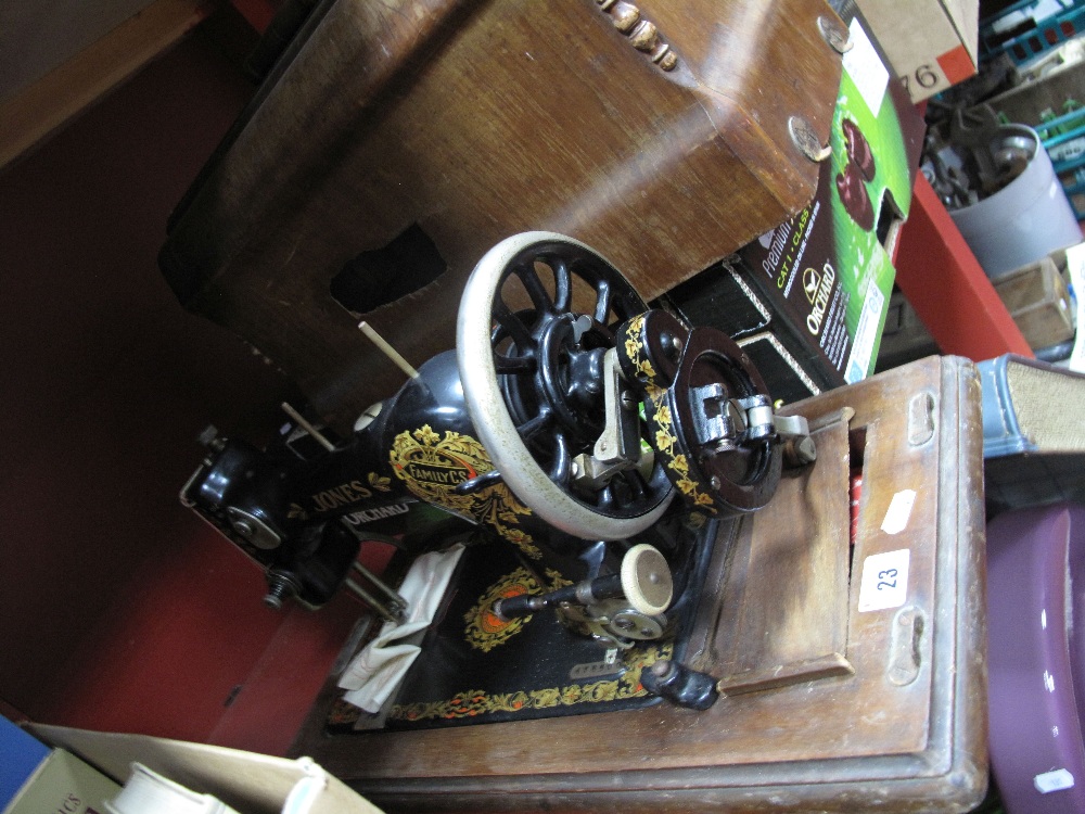 A Family C.S. Jones Sewing Machine, cased.