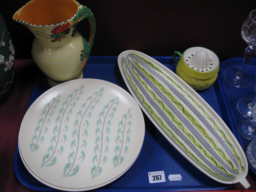 A Burleigh Art Deco Jug Vase, with dragon handle, Poole pottery oval dish (damaged) and two other