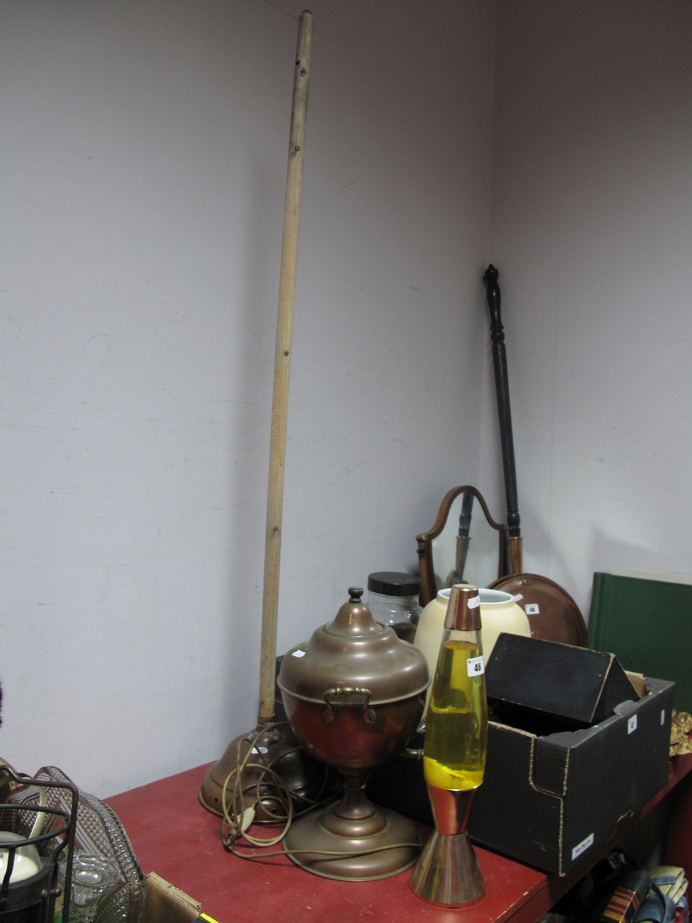 A Lava Lamp, copper tea urn, posser stick.
