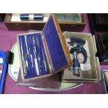 A Students Microscope Magnification 70X, drawing instruments in a mahogany box and including a