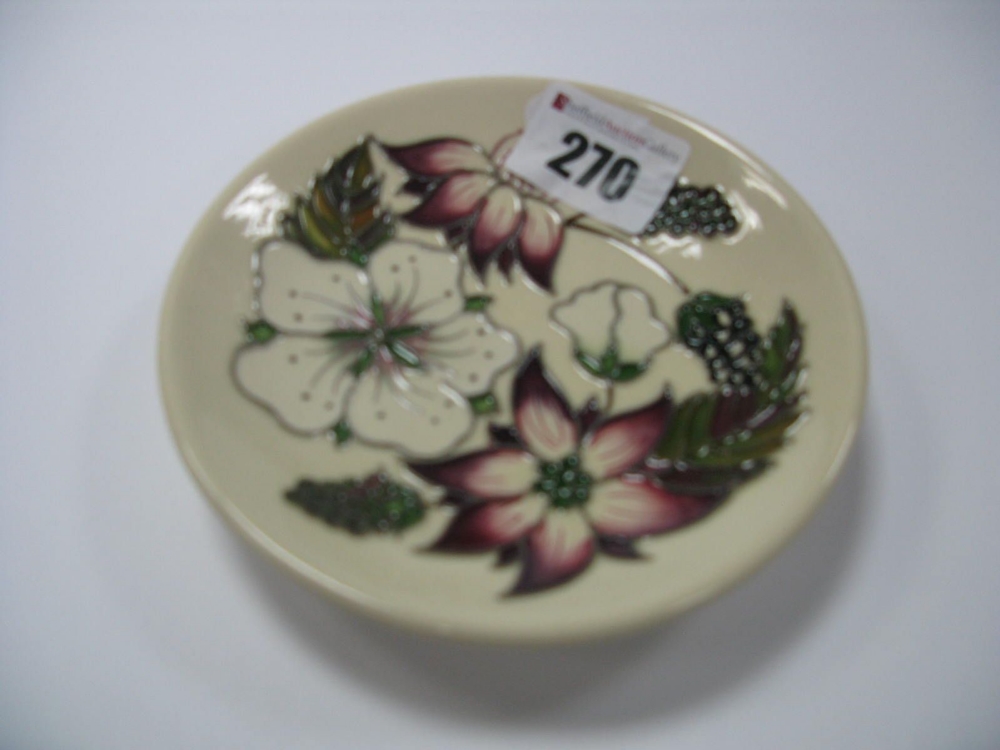 A Moorcroft Pottery Coaster, in the Bramble Revisited design by Alicia Amison, shape 780/4,