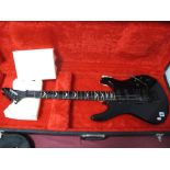 A Washburn G-8V Six String Electric Guitar, numbered 709 5004, USA, in glossy black, with plush