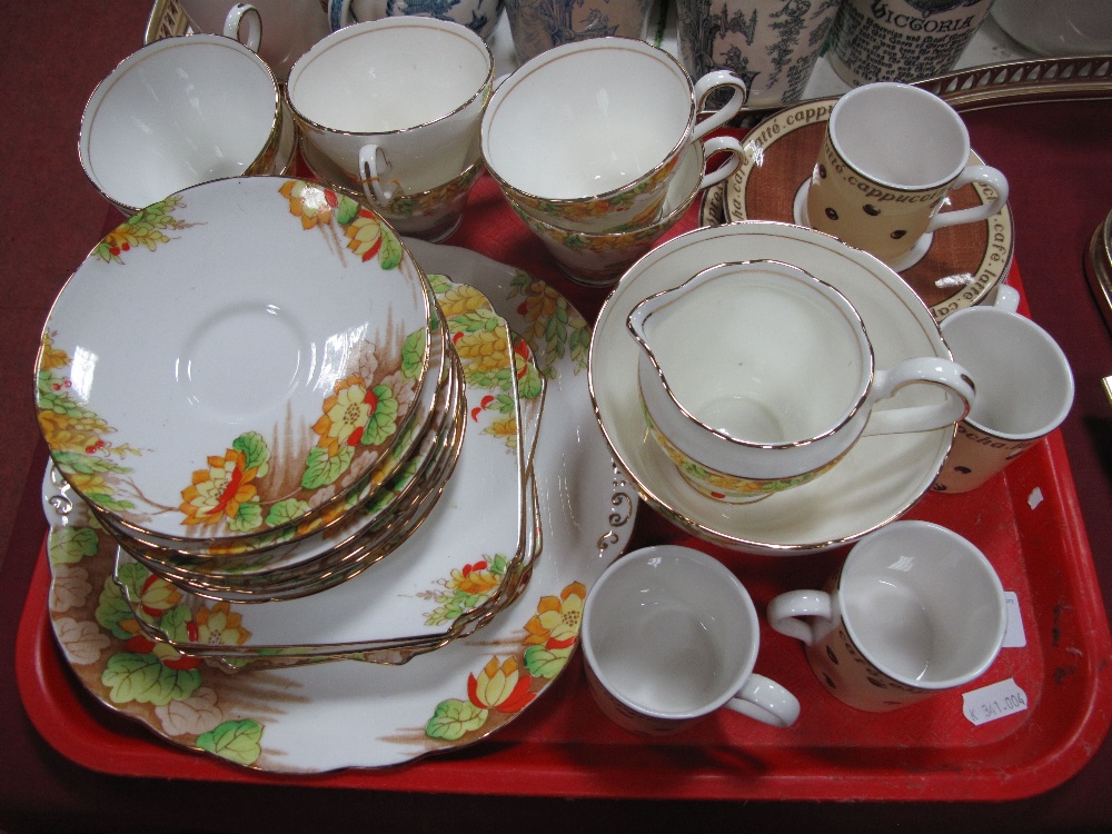 A Taylor & Kent 1920's Tea Service, of twenty-one pieces; four Doulton 'Coffee Time' cups and