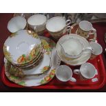 A Taylor & Kent 1920's Tea Service, of twenty-one pieces; four Doulton 'Coffee Time' cups and