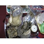 A 'Violeta' Skeleton Clock Under Glass Dome, Hermle example under plastic dome, etc:- One Tray