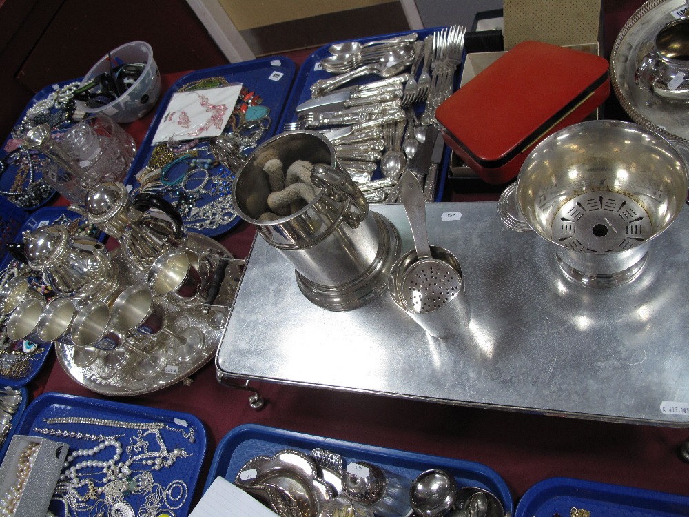 A Burner Stand/Hot Plate, with twin handles; together with a bottle holder, goblets, plated four