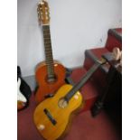 A Vicente Sanchis Model 28 Acoustic Guitar, and a Tatra classic acoustic guitar. (2)