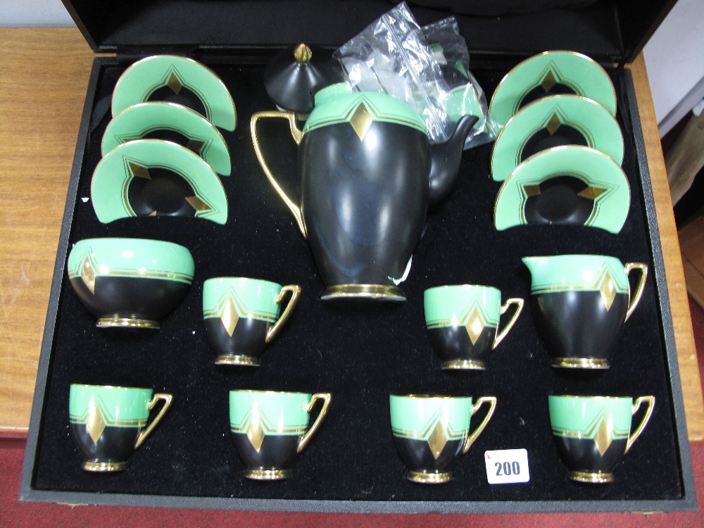 A Carlton Ware Art Deco Black, Green and Gilt Coffee Service, comprising six saucers, six cups,