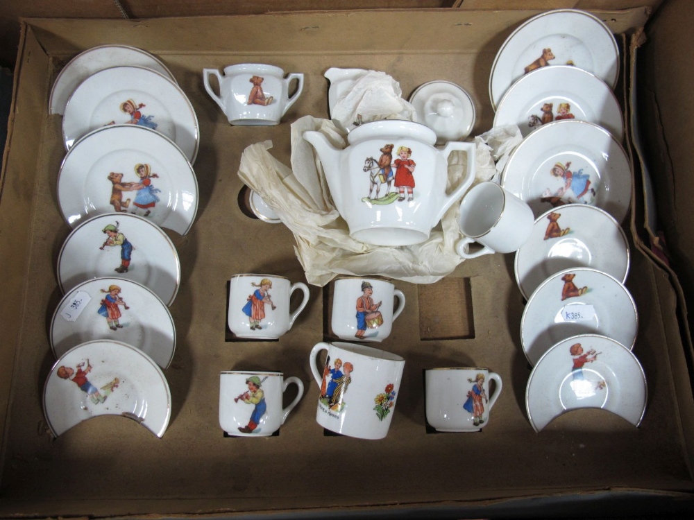 A XX Century Child's Transfer Tea Set, often with teddy bear subject, boxed, box poor.