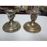 A Pair of Dwarf Candlesticks, each of plain circular form, stamped "Birks Sterling", 7.5cm high. (2)