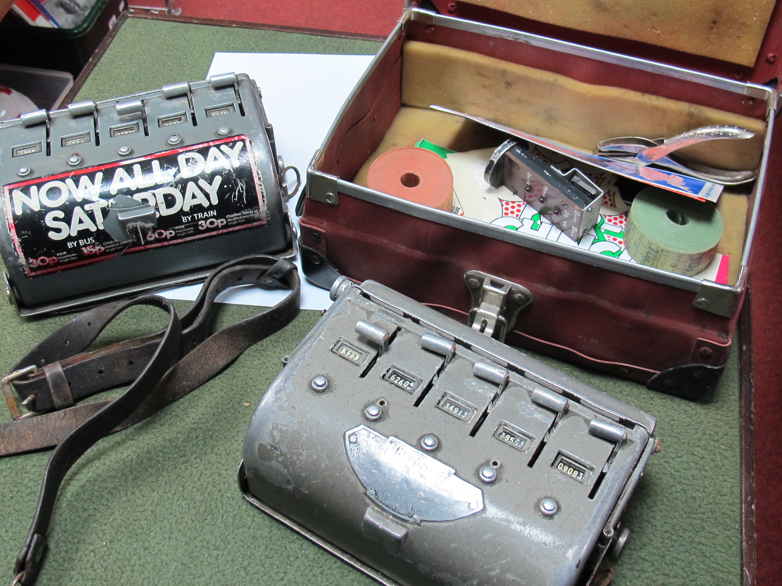 Two 1950's Bus Tickets Machines, a ticket punch, bus tickets among associated items.