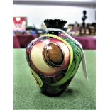 A Moorcroft Pottery Miniature Pottery Vase, in the Queen's Choice design by Emma Bossons, shape 03/